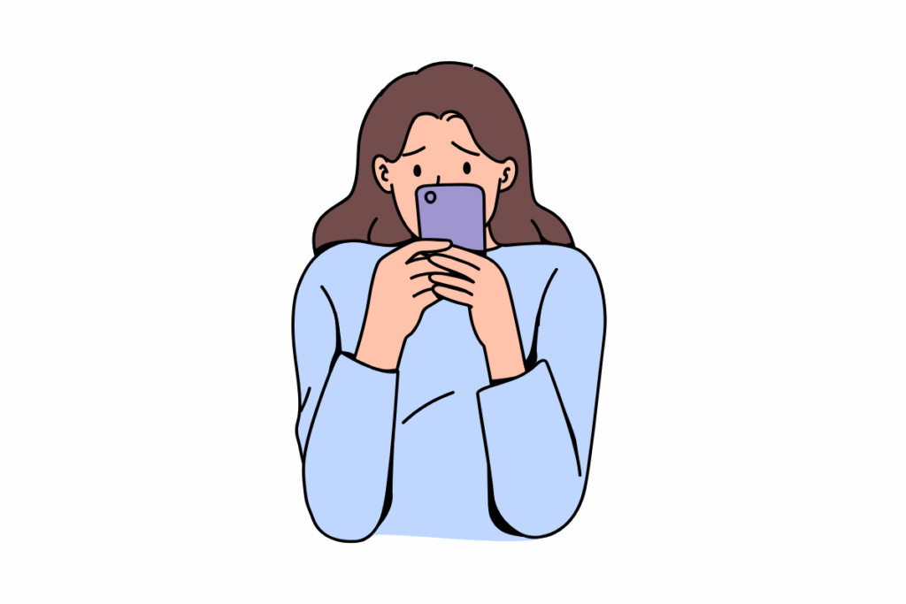 不安そうにtextを打つ女性